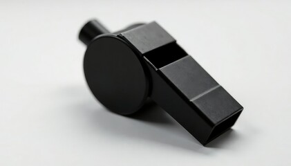 Classic black plastic whistle, textured surface , sports, equipment, tool