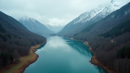 Obraz premium Lac du Lauzon in France on a cool, rainy winter day at midday, captured from above.