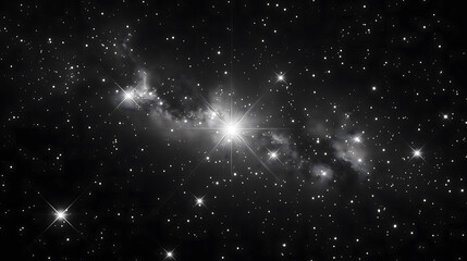 Bright stars and glowing Milky Way galaxy in a black and white night sky