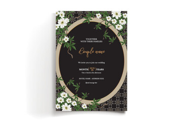 WEDDING INVITATION FRAME WITH FLOWER DECORATIONS AND FRESH LEAVES
