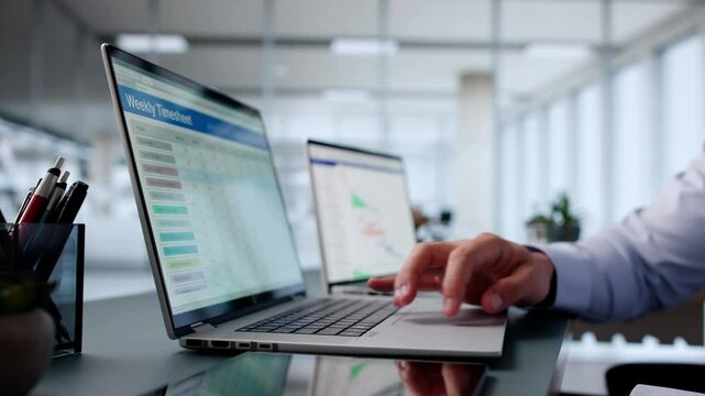 Busy Man In Office Using Computer