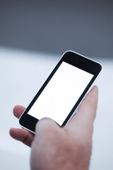 Human Hand using smartphone mobile phone with social media concept.