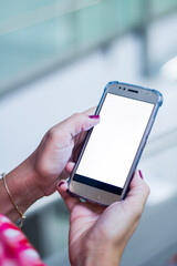 Human Hand using smartphone mobile phone with social media concept.