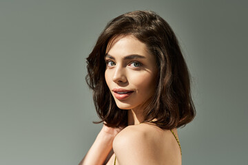Naklejka premium Beautiful young woman radiates style and confidence in summer attire on a bright day