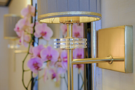 Luxurious ocean view or oceanview or outside balcony veranda cabin stateroom suite queen king double bed on luxury ocean liner cruiseship cruise ship in classic classy interior Art Deco style design