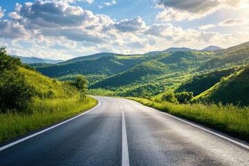 Naklejka premium Winding road through verdant hills under a bright sky