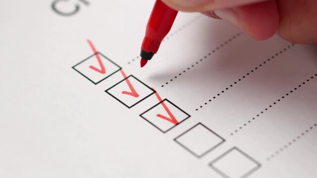 African American Hand Marking Check Mark