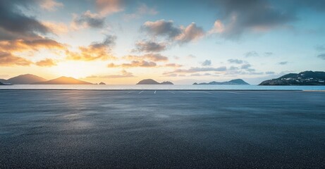 Fototapeta premium Empty parking lot at sunset overlooking the sea