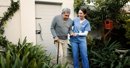 Retirement home, nurse and helping senior man with cane outdoor for mobility support,...