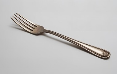 A single metal fork isolated on white background