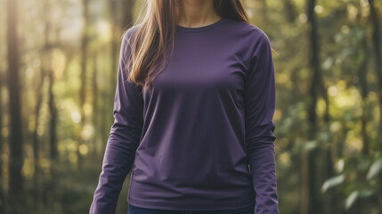 mockup of a woman wearing a plain purple long sleeve t-shirt isolated on forest background, Ai generated images
