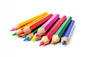 Naklejka premium Colored pencils arranged on white background