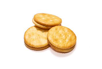 Biscuits with cheese cream filling isolated on white background. After edits.