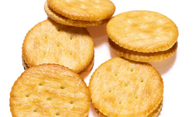 Biscuits with cheese cream filling isolated on white background. After edits.