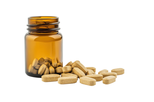 A close-up view of an amber bottle with scattered vitamins on a light background