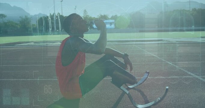 Drinking water on track, athlete with prosthetic legs and data overlay animation