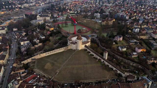 Fort Munot, Schaffhausen, Switzerland aerial view in winter warm weather at dawn. Munot ist Zirkularfestung im Zentrum schweizerischen Stadt Schaffhausen auf Emmersberg in der Schweiz Luftaufnahme. 