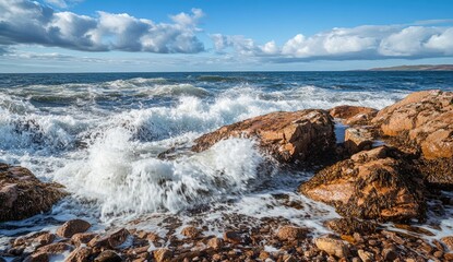 Ocean waves crashing on rocky shore