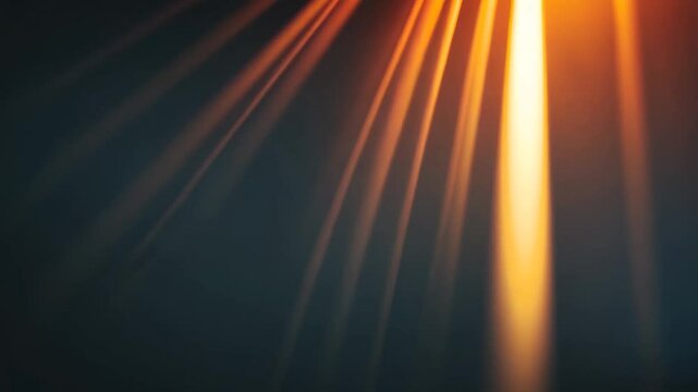 Blurred pattern of golden light beams