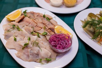 Fish ham on a plate on a served table