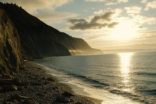 Coastal sunset over pebble beach