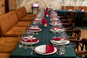 set table with cutlery and glasses
