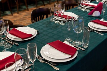 set table with cutlery and glasses