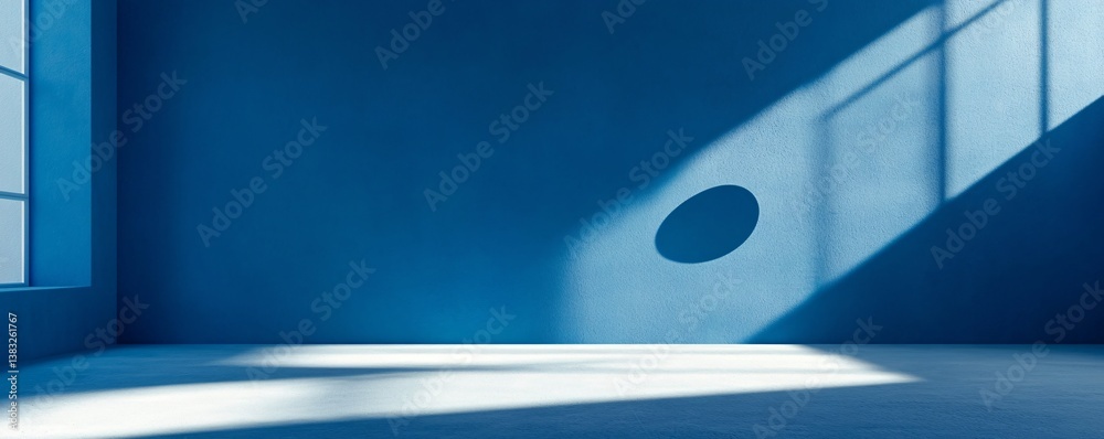 Poster sunlight casting geometric shapes in an empty room with blue walls