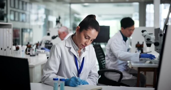 Writing, woman or scientist learning on computer for test research, development or innovation. Medical, technology or reading science report for pharma exam, microbiology or engineering in laboratory