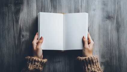 Naklejka premium Hands Holding Open Blank Book Surrounded by Green Houseplants for Reading, Nature-Inspired Themes, and Study Aesthetics