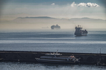Modern cruiseship cruise ship liner Fascinosa arrival into Napoli Naples, Italy port during summer...
