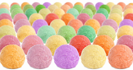 Yummy ice cream of different flavors. Colorful scoops on white background