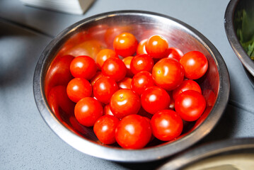 Fresh Cherry Tomatoes in Metal Bowl.