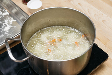 Deep Frying Shrimp in Hot Cooking Oil.