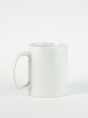 Two-tone 11oz mug on isolated background. Mug with black handle and inner part.