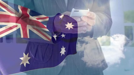 Person using smartphone with Australian flag overlay, cloudy sky in background - Powered by Adobe