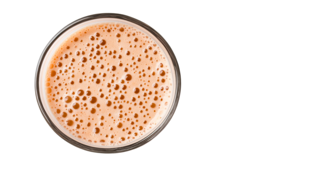 Creamy beverage with bubbles in a glass on a transparent background