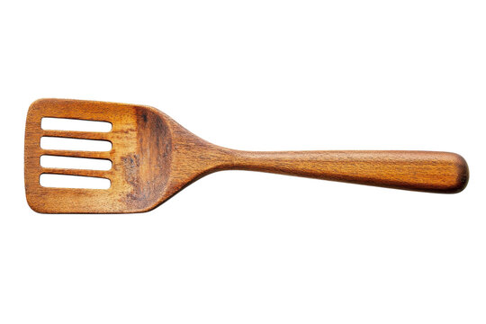 A wooden spatula rests elegantly on a white background, highlighting its grain and design