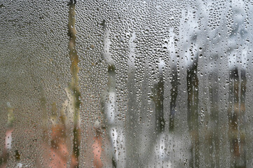 Background condensation of water on the window glass