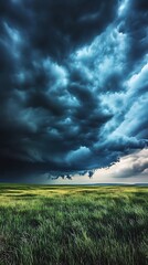 Dramatic Stormy Sky Over Green Grass Field with Impending Rain Clouds View