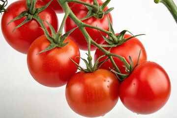 Fresh, ripe red tomatoes on the vine with glossy surfaces, isolated on a transparent background for food and design use.