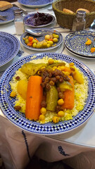Saffron Couscous with beef and vegetables served with traditional plate