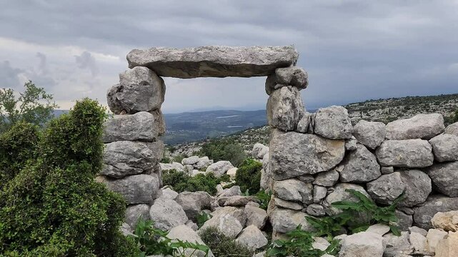 A stone gate, commonly found in many ancient settlements of Ancient Cilicia, is located within the ruins of Sakizlik, in the Sağlıklı neighborhood of Tarsus, Mersin.