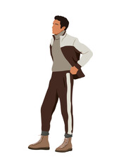 Obraz premium Young man wearing trendy modern street style winter outfit. 