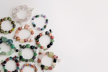 Handmade gemstone bracelets with natural stones and beads. Artisan jewelry crafted from healing crystals with photos of stones and bracelets.
