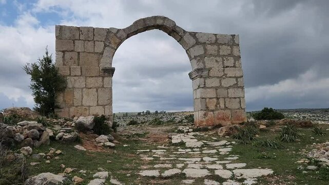 The 5th-century arched Victory Gate (or Border Gate to Cilicia region) on the ancient Cilicia Road in Saglikli neighborhood of Tarsus, Mersin in a rainy spring day.