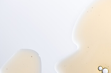 Textured background of cosmetic moisturizing gel or skin serum. Copy space