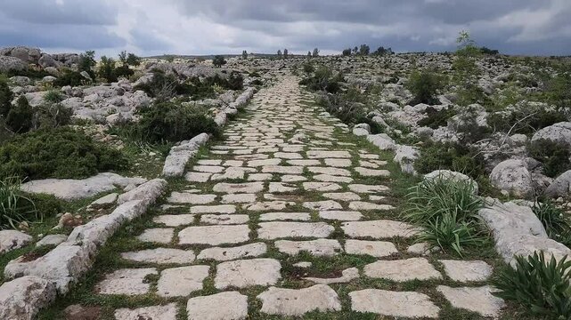 In Saglikli, Tarsus, Mersin, a view of the ancient Roman road which is 3 m wide and 3 km long. Curbstones are still intact, showcasing its historical significance.