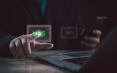 Decision-making and digital approval concept. Businessman presses virtual 'YES' button on digital...
