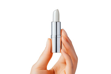 Close up of an elegant feminine hand offering a high end metallic lipstick tube against a clean bright and minimalist studio background This image can be used for beauty fashion